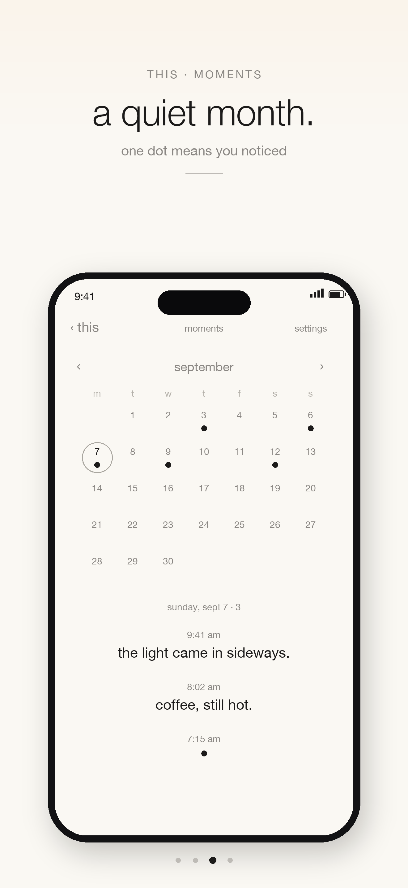 Moments screen: a minimal month calendar with dots under days that have entries